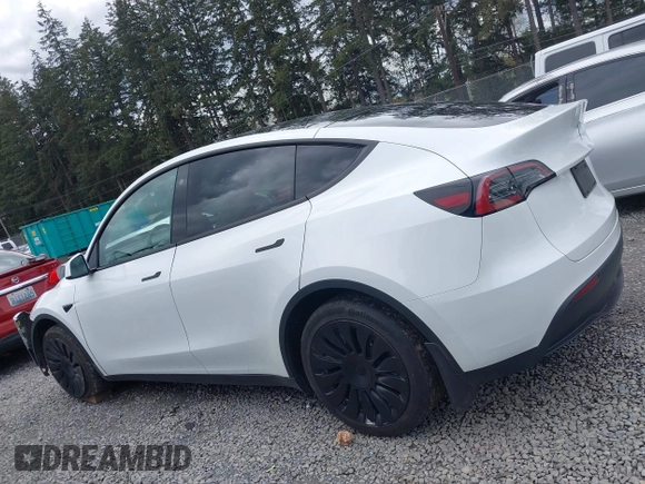 2023 Tesla Model Y Long Range z VIN 7SAYGAEEXPF647352, wystawiony jako IAAI lot #41955933 z przebiegiem Nie podano mil oraz . Historia ofert i sprzedaży dostępna na DreamBid. Obrazek 15.