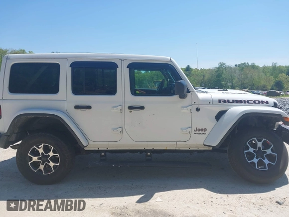 2021 Jeep Wrangler Unlimited Rubicon with VIN 1C4HJXFG5MW586842, listed as a IAAI auction lot 42186683 with 76,450 mi miles and . Bid and sale history available at DreamBid. Image 13.