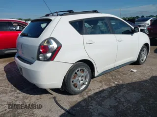 2009 Pontiac Vibe 1SB z VIN 5Y2SP67089Z436455, wystawiony jako IAAI lot #42435887 z przebiegiem 211 806 mil mil oraz . Historia ofert i sprzedaży dostępna na DreamBid. Obrazek 4.