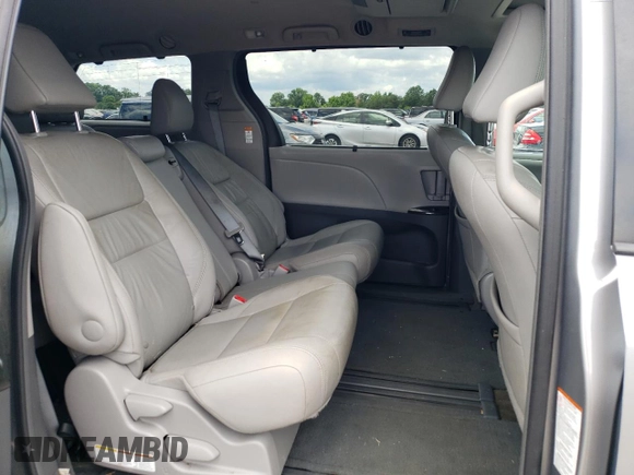 2015 Toyota Sienna XLE with VIN 5TDYK3DC0FS592251, listed as a Copart auction lot 60126165 with 118,925 mi miles and Salvage title. Bid and sale history available at DreamBid. Image 11.