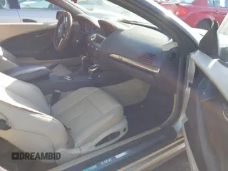 2004 BMW 6 Series 645Ci with VIN WBAEK73404B320188, listed as a IAAI auction lot 41341111 with 126,233 mi miles. Bid and sale history available at carsss.com. Image 5.