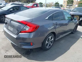 2017 Honda Civic LX with VIN 2HGFC2F52HH566363, listed as a IAAI auction lot 41934807 with 94,063 mi miles and . Bid and sale history available at DreamBid. Image 4.