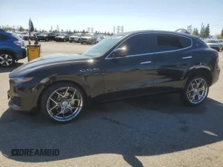 2020 Maserati Levante S z VIN ZN661YUA4LX344675, wystawiony jako Copart lot #46323015 z przebiegiem Nie podano mil oraz Szkoda całkowita • Salvage title. Historia ofert i sprzedaży dostępna na DreamBid. Obrazek 1.