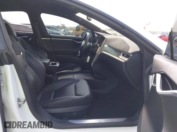 2016 Tesla Model S 70 z VIN 5YJSA1E11GF159425, wystawiony jako IAAI lot #42377639 z przebiegiem 79 767 mil mil oraz . Historia ofert i sprzedaży dostępna na DreamBid. Obrazek 5.