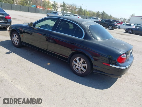 2003 Jaguar S-Type with VIN SAJEA01T13FM70486, listed as a IAAI auction lot 41989501 with 100,109 mi miles and . Bid and sale history available at DreamBid. Image 3.