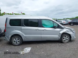 2014 Ford Transit Connect XLT z VIN NM0GE9F77E1155359, wystawiony jako IAAI lot #42321531 z przebiegiem 175 183 mil mil oraz . Historia ofert i sprzedaży dostępna na DreamBid. Obrazek 13.