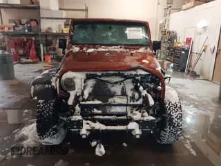 2014 Jeep Wrangler Unlimited Sport with VIN 1C4BJWDG6EL194569, listed as a IAAI auction lot 41549268 with 122,740 mi miles. Bid and sale history available at carsss.com. Image 13.