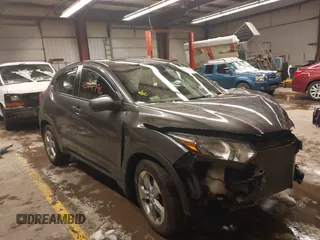 2018 Honda HR-V LX with VIN 3CZRU6H35JM704037, listed as a IAAI auction lot 41574796 with 140,671 mi miles. Bid and sale history available at carsss.com. Image 1.