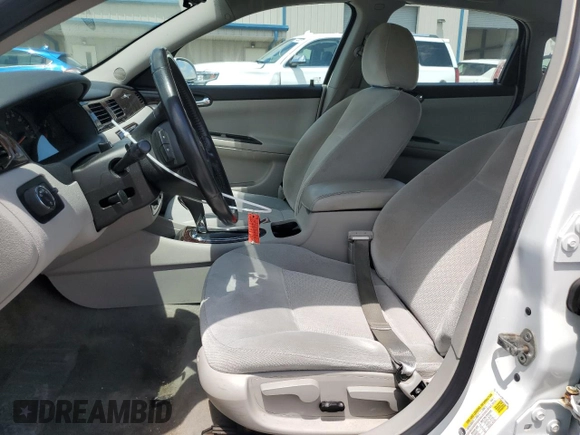 2014 Chevrolet Impala LS with VIN 2G1WA5E30E1155904, listed as a Copart auction lot 56856485 with 149,977 mi miles and Salvage title. Bid and sale history available at DreamBid. Image 7.