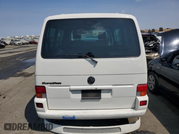 2003 Volkswagen EuroVan MV с VIN WV2MB47033H038192, выставлен на аукционе Copart как лот 67783954 с пробегом 176 595 миль миль и Списание • Salvage title. История ставок и продаж доступна на DreamBid. Изображение 6.