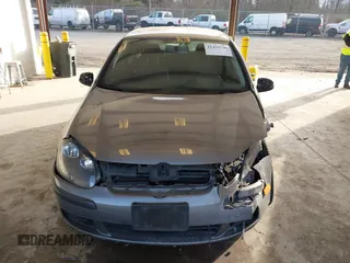 2009 Volkswagen Rabbit S with VIN WVWAA71K99W073355, listed as a IAAI auction lot 41459740 with 124,952 mi miles. Bid and sale history available at carsss.com. Image 12.