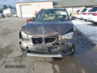2014 BMW X1 xDrive28i with VIN WBAVL1C56EVY19340, listed as a IAAI auction lot 41340436 with 85,867 mi miles. Bid and sale history available at carsss.com. Image 6.