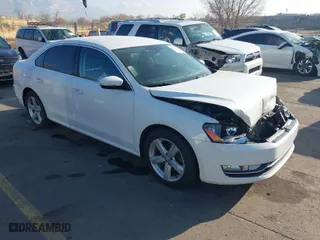 2015 Volkswagen Passat 1.8T S with VIN 1VWAT7A38FC084408, listed as a IAAI auction lot 41014374 with 112,174 mi miles. Bid and sale history available at carsss.com. Image 1.