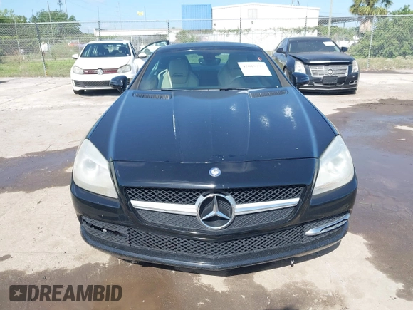 2013 Mercedes-Benz SLK 250 z VIN WDDPK4HA5DF059891, wystawiony jako IAAI lot #42015777 z przebiegiem 79 255 mil mil oraz . Historia ofert i sprzedaży dostępna na DreamBid. Obrazek 6.