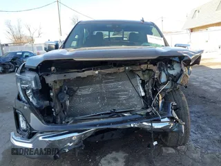 2021 GMC Sierra 1500 SLT z VIN 3GTU9DED9MG176881, wystawiony jako IAAI lot #41140356 z przebiegiem 21 553 mil mil oraz . Historia ofert i sprzedaży dostępna na DreamBid. Obrazek 13.