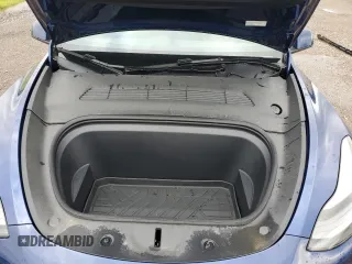 2024 Tesla Model Y Long Range z VIN 7SAYGDEE0RA286070, wystawiony jako Copart lot #58200425 z przebiegiem 16 881 mil mil oraz Szkoda całkowita • Salvage title. Historia ofert i sprzedaży dostępna na DreamBid. Obrazek 12.
