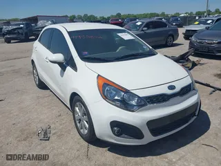 2013 Kia Rio SX with VIN KNADN5A30D6097807, listed as a IAAI auction lot 41958802 with 23,944 mi miles. Bid and sale history available at carsss.com. Image 1.