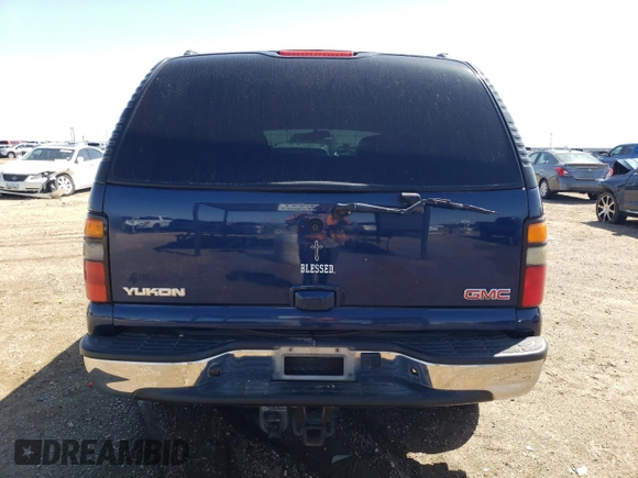 2003 GMC Yukon SLT z VIN 1GKEK13Z53J325679, wystawiony jako Copart lot #52260985 z przebiegiem 320 061 mil mil oraz Czysty tytuł • Clean title. Historia ofert i sprzedaży dostępna na DreamBid. Obrazek 6.