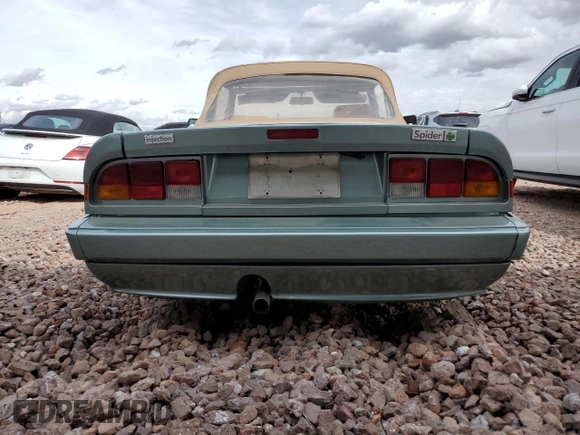 1986 Alfa Romeo Spider Veloce z VIN ZARBA5417G1040320, wystawiony jako Copart lot #48623735 z przebiegiem 134 891 mil mil oraz Tytuł czysty. Historia ofert i sprzedaży dostępna na DreamBid. Obrazek 6.