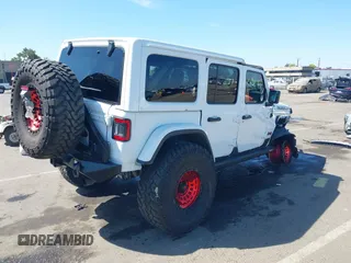 2018 Jeep Wrangler Unlimited Rubicon with VIN 1C4HJXFGXJW110629, listed as a IAAI auction lot 42141572 with 65,973 mi miles and . Bid and sale history available at DreamBid. Image 4.
