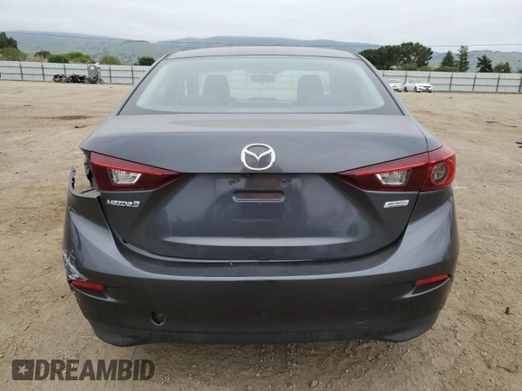 2016 Mazda 3 i Sport with VIN JM1BM1U74G1285879, listed as a Copart auction lot 54601455 with 67,136 mi miles and Salvage Title. Bid and sale history available at DreamBid. Image 6.