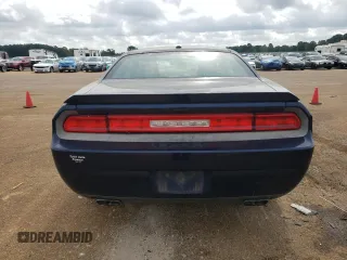 2013 Dodge Challenger SXT z VIN 2C3CDYAG3DH578949, wystawiony jako Copart lot #54664815 z przebiegiem 205 376 mil mil oraz Szkody całkowita. Historia ofert i sprzedaży dostępna na DreamBid. Obrazek 6.