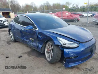2020 Tesla Model 3 Performance z VIN 5YJ3E1EC7LF784223, wystawiony jako IAAI lot #42084928 z przebiegiem 100 006 mil mil oraz . Historia ofert i sprzedaży dostępna na DreamBid. Obrazek 1.