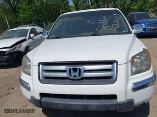 2007 Honda Pilot EX-L with VIN 5FNYF18567B032406, listed as a IAAI auction lot 42120219 with 205,687 mi miles. Bid and sale history available at carsss.com. Image 6.