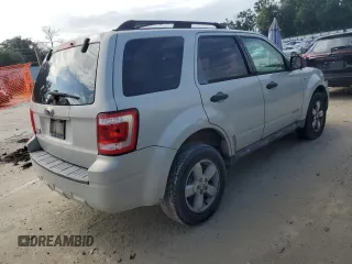 2008 Ford Escape XLT with VIN 1FMCU03108KD50732, listed as a Copart auction lot 62391735 with 224,973 mi miles and Salvage title. Bid and sale history available at DreamBid. Image 3.