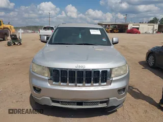 2012 Jeep Grand Cherokee Laredo with VIN 1C4RJEAG4CC251359, listed as a IAAI auction lot 41986762 with 172,331 mi miles. Bid and sale history available at carsss.com. Image 12.