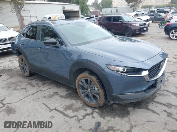 2022 Mazda CX-30 S Carbon Edition with VIN 3MVDMBCL0NM456154, listed as a IAAI auction lot 42153202 with 40,372 mi miles and . Bid and sale history available at DreamBid. Image 1.