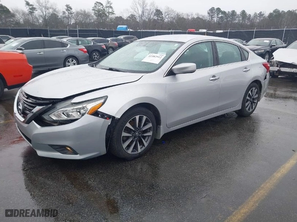 2016 Nissan Altima 2.5 SR with VIN 1N4AL3AP3GC129874, listed as a IAAI auction lot 41582912 with 106,536 mi miles. Bid and sale history available at carsss.com. Image 2.