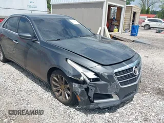 2014 Cadillac CTS Sedan RWD with VIN 1G6AP5SX2E0188411, listed as a IAAI auction lot 42106784 with 151,171 mi miles. Bid and sale history available at carsss.com. Image 6.