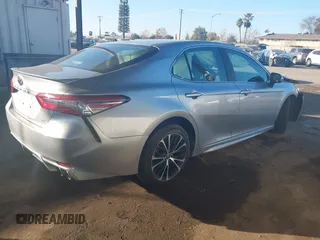 2018 Toyota Camry LE with VIN 4T1B11HK9JU068675, listed as a IAAI auction lot 41299139 with 144,675 mi miles. Bid and sale history available at carsss.com. Image 4.
