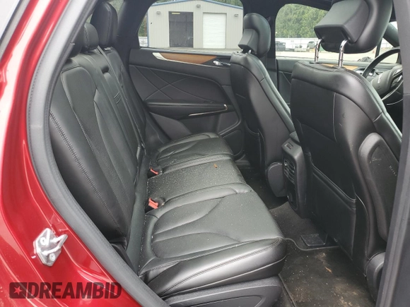 2015 Lincoln MKC z VIN 5LMTJ2AHXFUJ10820, wystawiony jako Copart lot #57139315 z przebiegiem 128 714 mil mil oraz Szkody całkowita. Historia ofert i sprzedaży dostępna na DreamBid. Obrazek 11.