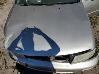 1996 Nissan Altima XE z VIN 1N4BU31D0TC157956, wystawiony jako Copart lot #80838464 z przebiegiem 132 503 mil mil oraz Szkoda całkowita • Salvage title. Historia ofert i sprzedaży dostępna na DreamBid. Obrazek 11.