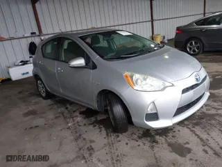 2012 Toyota Prius c One with VIN JTDKDTB34C1005531, listed as a IAAI auction lot 41529024 with 195,916 mi miles. Bid and sale history available at carsss.com. Image 1.