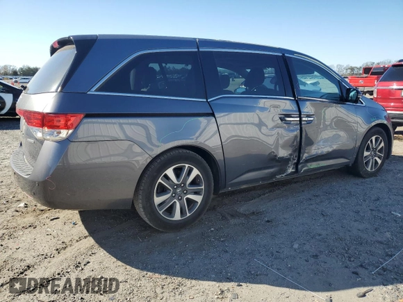 2014 Honda Odyssey Touring with VIN 5FNRL5H96EB061876, listed as a Copart auction lot 49759935 with 132,591 mi miles and Salvage Title. Bid and sale history available at DreamBid. Image 3.
