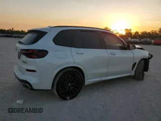 2024 BMW X5 M60i with VIN 5UX33EU07R9T12139, listed as a Copart auction lot 77326454 with 0 mi miles and Salvage Title. Bid and sale history available at carsss.com. Image 3.