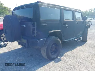 2003 Hummer H2 z VIN 5GRGN23UX3H140510, wystawiony jako IAAI lot #42325527 z przebiegiem 140 010 mil mil oraz . Historia ofert i sprzedaży dostępna na DreamBid. Obrazek 4.