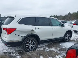2017 Honda Pilot EX-L with VIN 5FNYF6H52HB015651, listed as a IAAI auction lot 41538814 with 121,433 mi miles and . Bid and sale history available at DreamBid. Image 13.