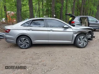 2020 Volkswagen Jetta SEL z VIN 3VWE57BU9LM082552, wystawiony jako IAAI lot #42091492 z przebiegiem 60 775 mil mil oraz . Historia ofert i sprzedaży dostępna na DreamBid. Obrazek 13.