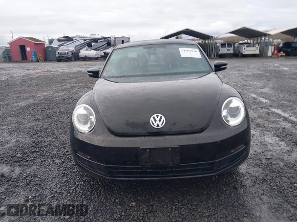 2014 Volkswagen Beetle 2.5L w/Sun with VIN 3VWJP7AT3EM608906, listed as a IAAI auction lot 41501830 with 42,804 mi miles and . Bid and sale history available at DreamBid. Image 12.