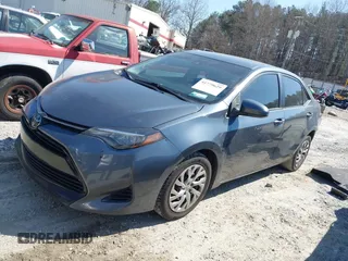 2019 Toyota Corolla L with VIN 2T1BURHE4KC134729, listed as a IAAI auction lot 41779629 with 240,685 mi miles. Bid and sale history available at carsss.com. Image 2.