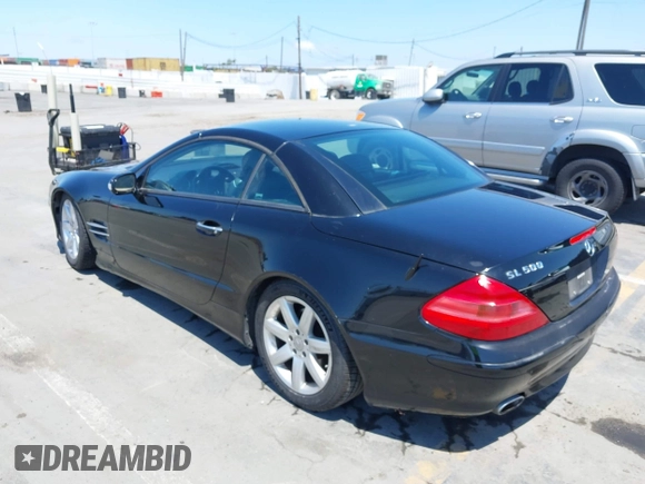 2003 Mercedes-Benz SL 500 with VIN WDBSK75F23F015866, listed as a IAAI auction lot 42415510 with 141,049 mi miles and . Bid and sale history available at DreamBid. Image 3.