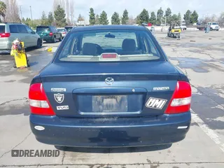 1999 Mazda Protege DX z VIN JM1BJ2229X0189290, wystawiony jako IAAI lot #41796448 z przebiegiem 281 528 mil mil oraz . Historia ofert i sprzedaży dostępna na DreamBid. Obrazek 17.