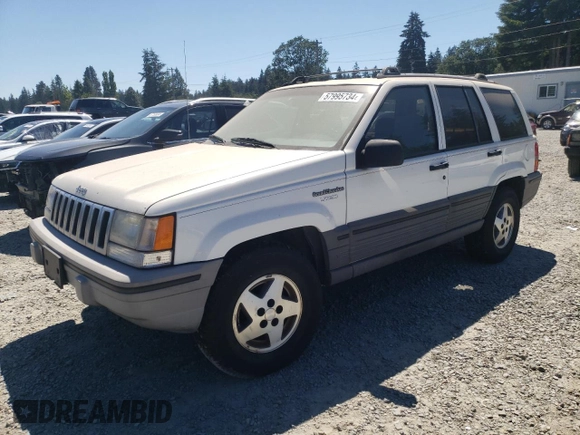 1994 Jeep Grand Cherokee Laredo with VIN 1J4GZ58Y7RC113333, listed as a Copart auction lot 57995734 with 220,950 mi miles and Clean Title. Bid and sale history available at carsss.com. Image 1.