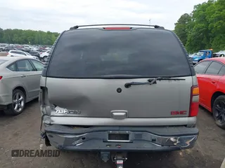 2002 GMC Yukon SLT z VIN 1GKEK13ZX2J247186, wystawiony jako IAAI lot #42095882 z przebiegiem 271 728 mil mil oraz . Historia ofert i sprzedaży dostępna na DreamBid. Obrazek 16.