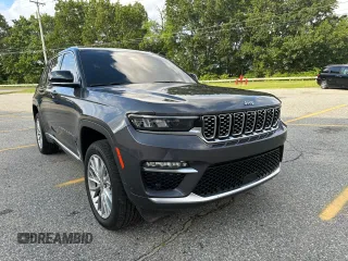 2023 Jeep Grand Cherokee Summit with VIN 1C4RJHEG2P8882566, listed as a Copart auction lot 65095905 with 59,970 mi miles and Salvage title. Bid and sale history available at DreamBid. Image 2.