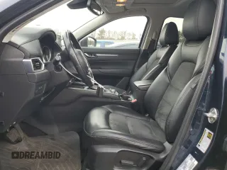 2018 Mazda CX-5 Touring with VIN JM3KFBCM9J0433729, listed as a Copart auction lot 49945515 with 143,064 mi miles and Salvage Title. Bid and sale history available at carsss.com. Image 7.